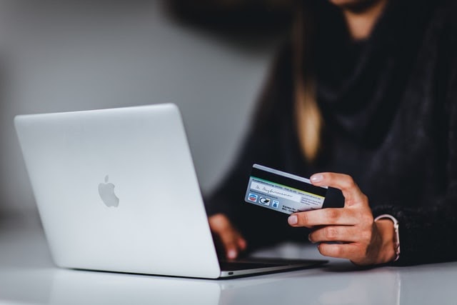 Girl doing payment for her online purchase